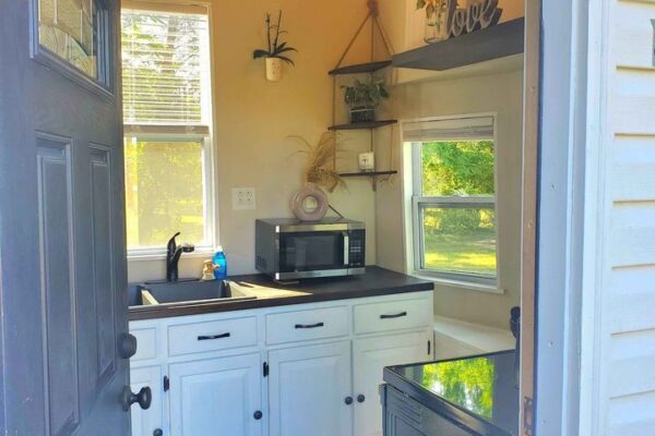 Purchase Charming Tiny House on wheels at Harrison, TN